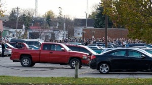 School crowd parked cars